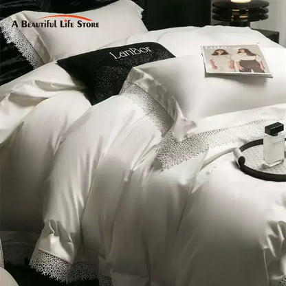 White satin duvet cover bedding set with delicate silver french lace edge and black lanbor logo pillow decorbites french lace