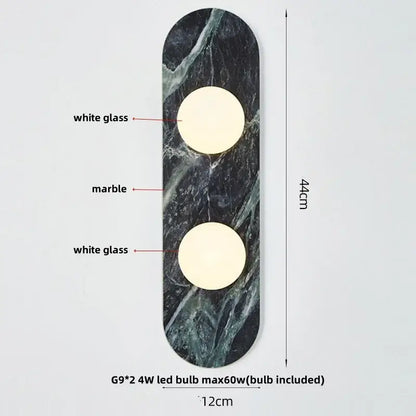French luxury black and white marble led wall light featuring dark green slab and two white glass bulbs for bedroom decorbites led wall