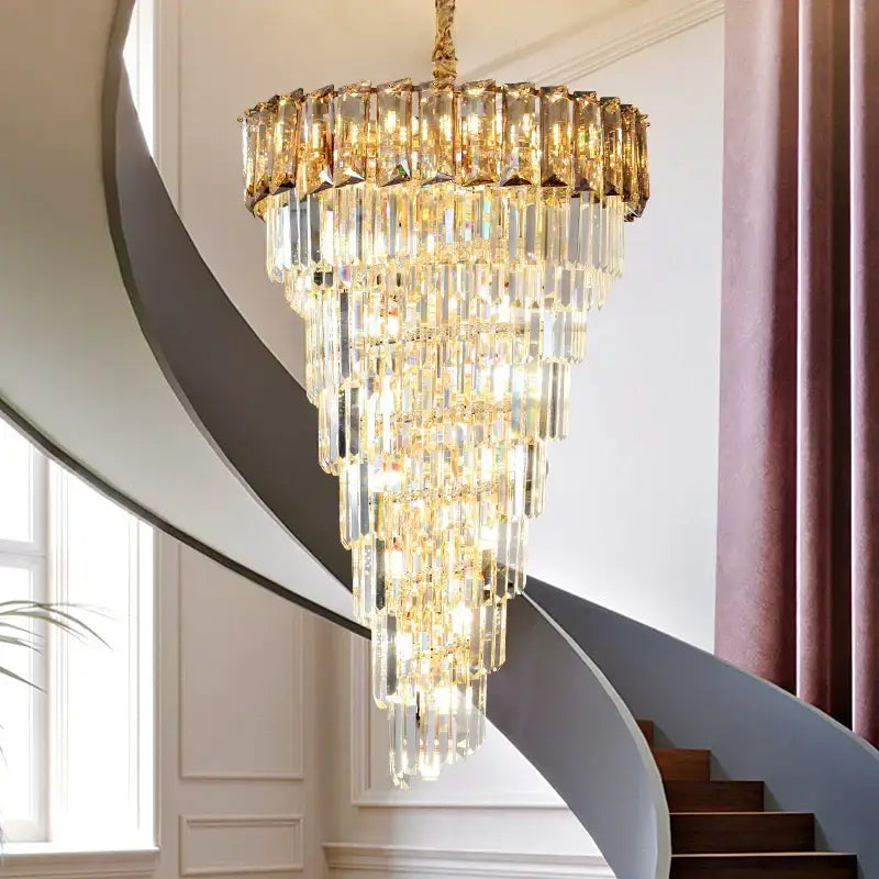 French luxury amber crystal chandelier with cascading clear and amber prisms on gold-toned frame for living room
