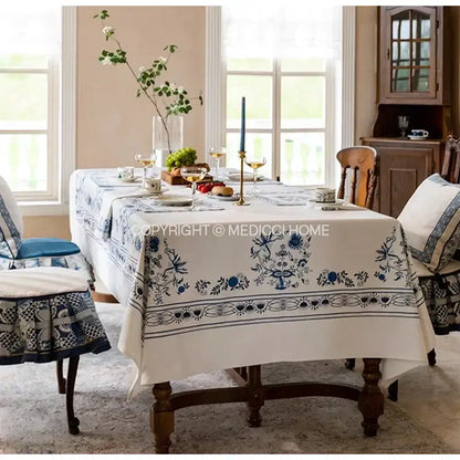 Elegant ivory blue onion print tablecloth with intricate floral embroidery and decorative border for dining room decorbites blue onion decor
