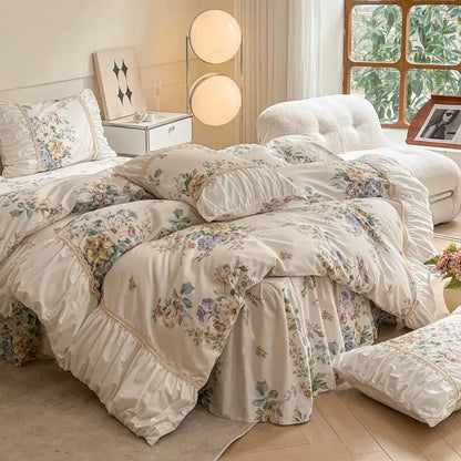 Cream-colored cotton bedding set with delicate ruffles and embroidered lace trim in decorbites french pastoral style