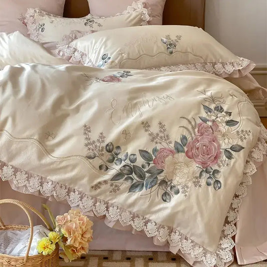 Cream-colored satin duvet cover with pink and gray floral embroidery and lace ruffles from decorbites french princess 1000tc bedding set