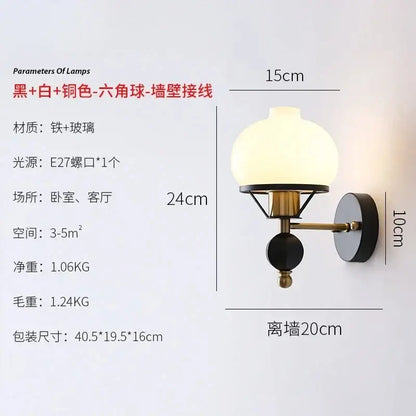 Black and brass-toned french retro wall lamp with frosted glass globe shade for living room wall sconce lighting