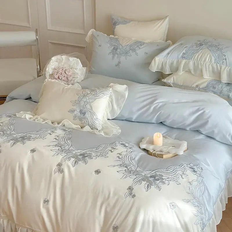 Delicate light blue and cream satin bedding set with floral lace ruffles from decorbites french romantic collection