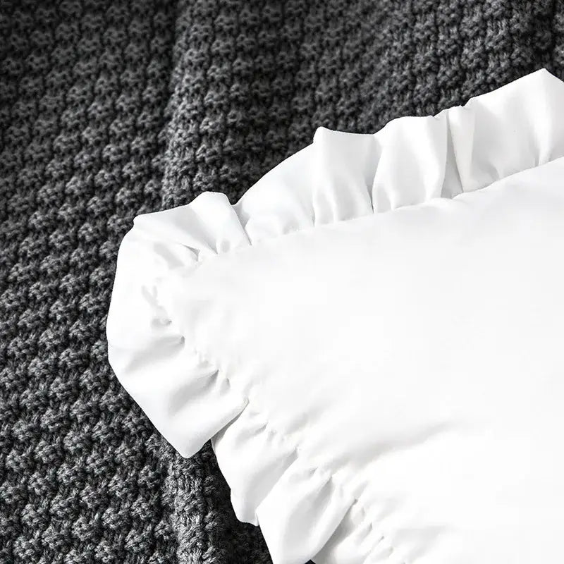 White cotton french ruffle pillow case featuring smooth satin-like ruffled sleeves for elegant bedroom decorbites decorbites french ruffle