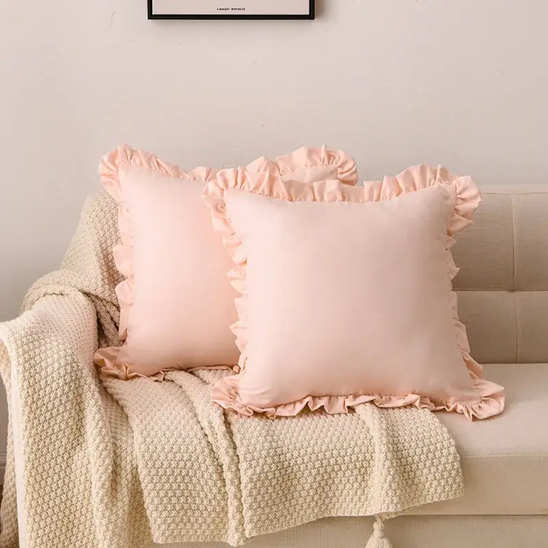 Two blush pink satin ruffle pillow cases with delicate edges for decorbites french ruffle bedroom decor