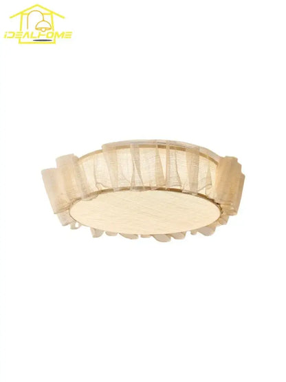 Beige circular ceiling light with ruffled fabric shade and wooden base from decorbites cream wind led collection for bedroom