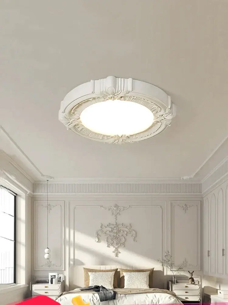White ornate decorbites french style ceiling light with intricate floral and scrollwork detailing for bedroom decor