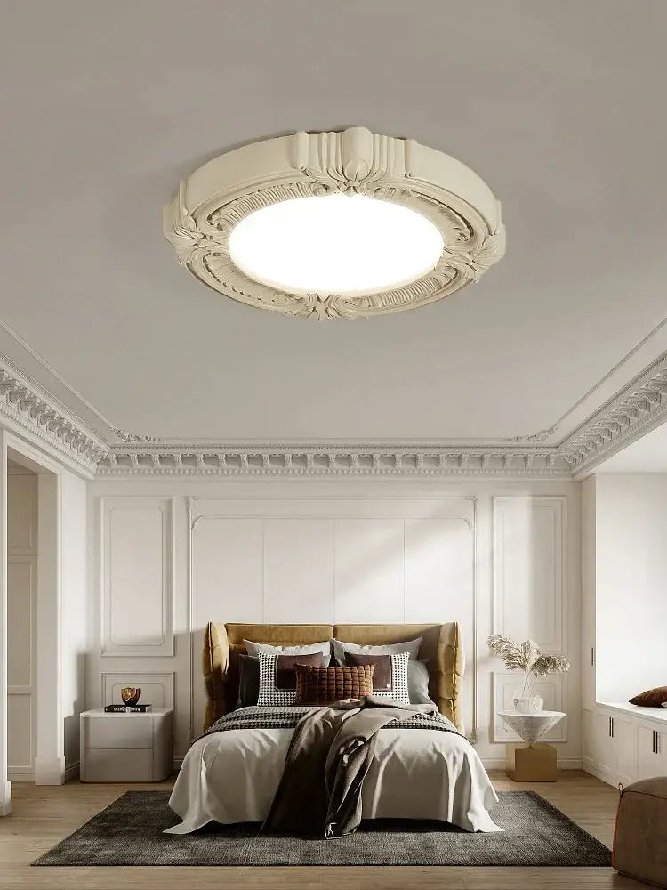 Off-white ornately carved french style ceiling light with circular frosted glass center for bedroom decorbites french style