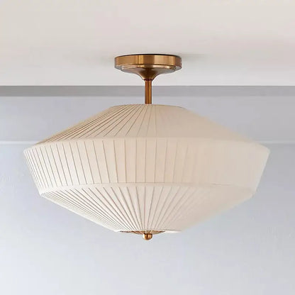 Cream-colored pleated fabric ceiling lamp with brass-finished metal frame decorbites french style fabric design