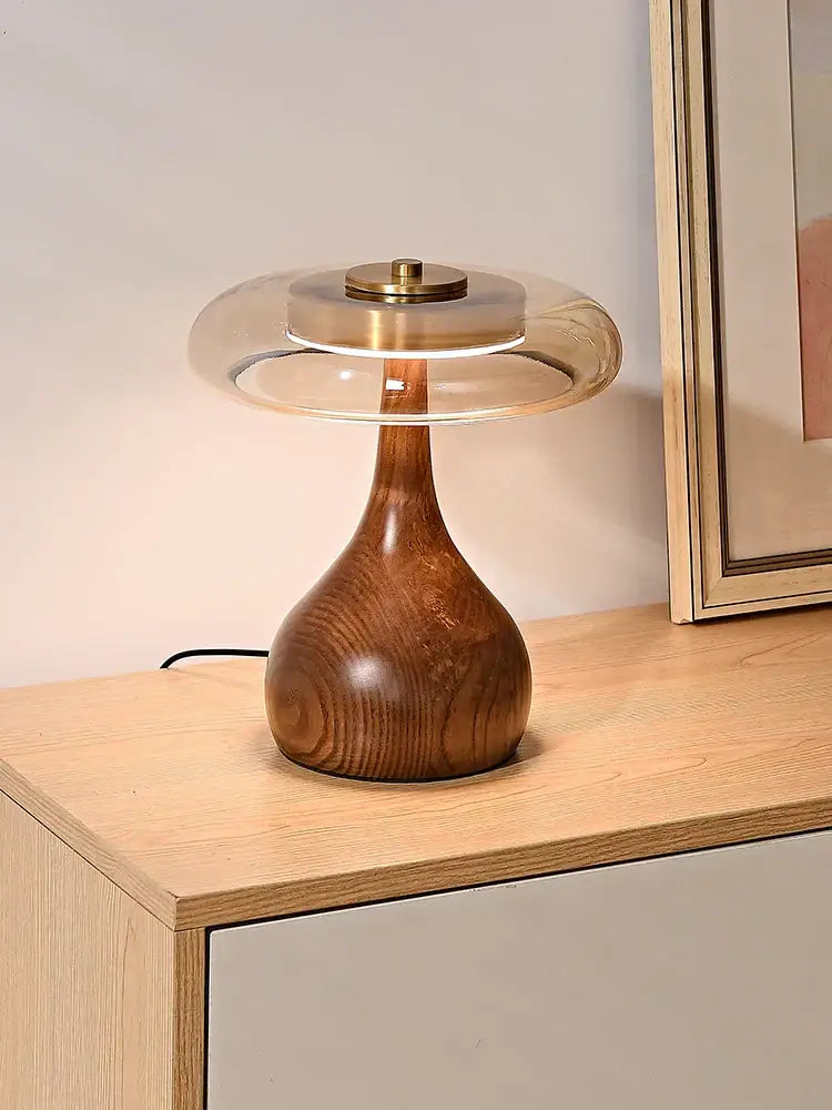 French style walnut table lamp featuring a polished andi walnut base with a glass dome shade and brass hardware