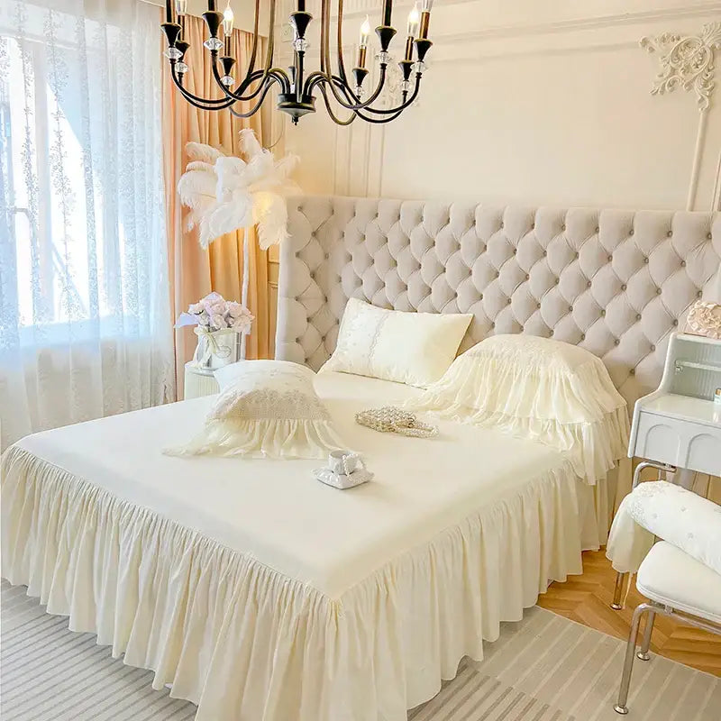 Cream-colored ruffled bed skirt with lace ruffles and soft fabric from decorbites French vintage bedding set decor