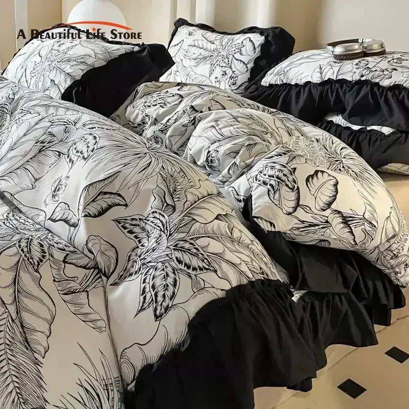 Black and cream french vintage duvet cover set with intricate botanical sketches and ruffled edges for bedroom bedding