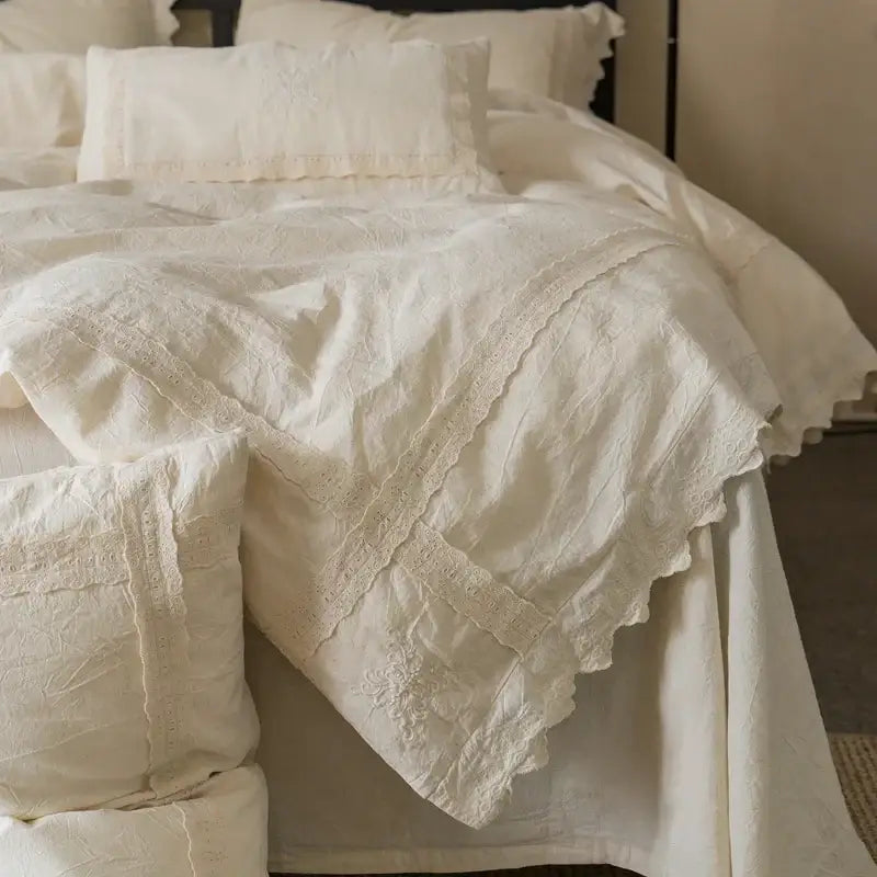 Cream-colored cotton linen bedding set with delicate lace trim and subtle embroidery for vintage bedroom decorbites cotton linen
