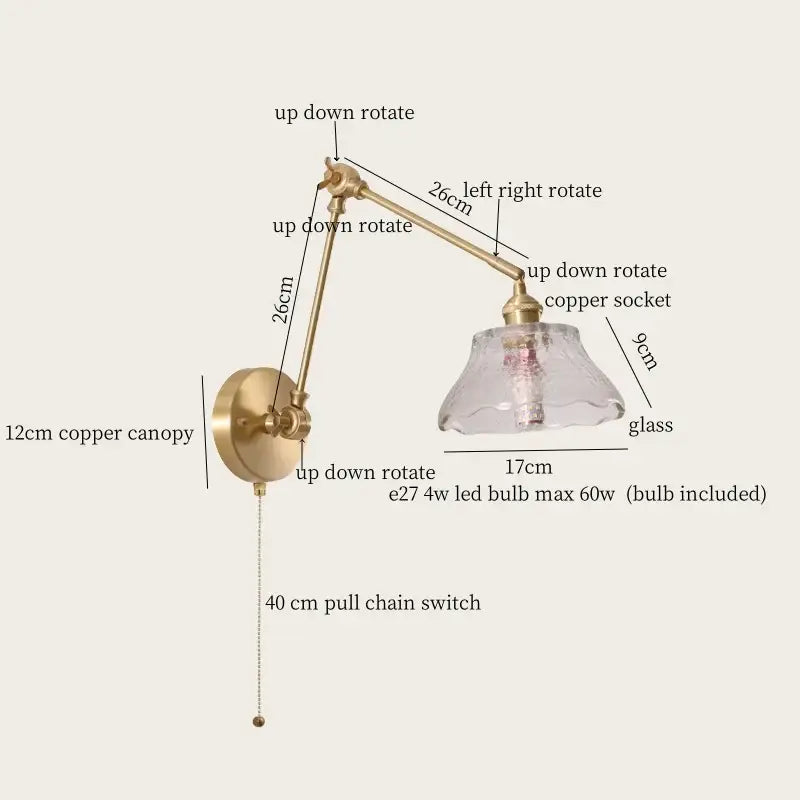 A brass-finished adjustable wall sconce with clear glass shade and copper canopy for cream resin led wall lights decorbites
