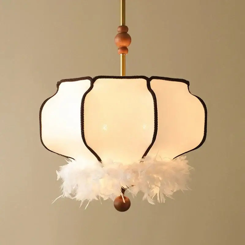Delicate cream white french vintage fabric chandelier with feather light and wooden accents for dining room decorbites french vintage