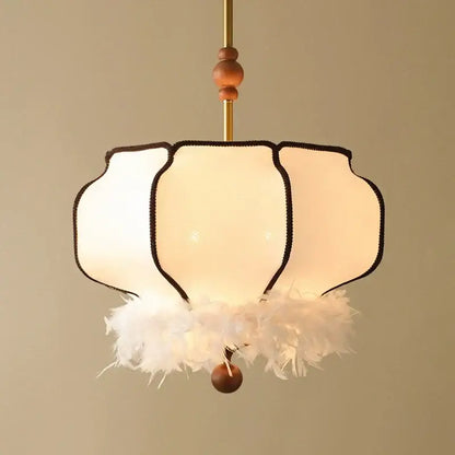 Delicate cream white french vintage fabric chandelier with feather light and wooden accents for dining room decorbites french vintage
