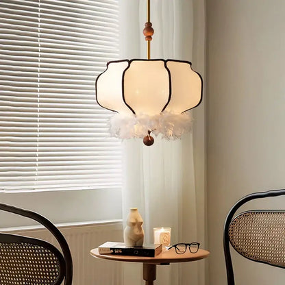 Delicate off-white french vintage fabric chandelier with black trim and cream feather fringe for dining room decorbites french vintage