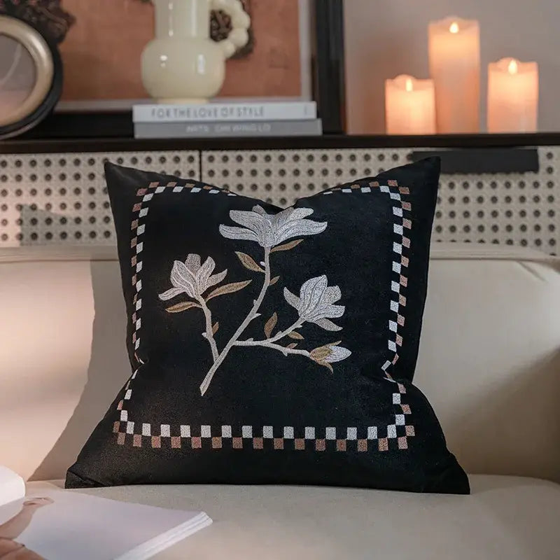Black velvet pillow featuring silver and beige vintage magnolia embroidered with a checkered border decorbites french vintage