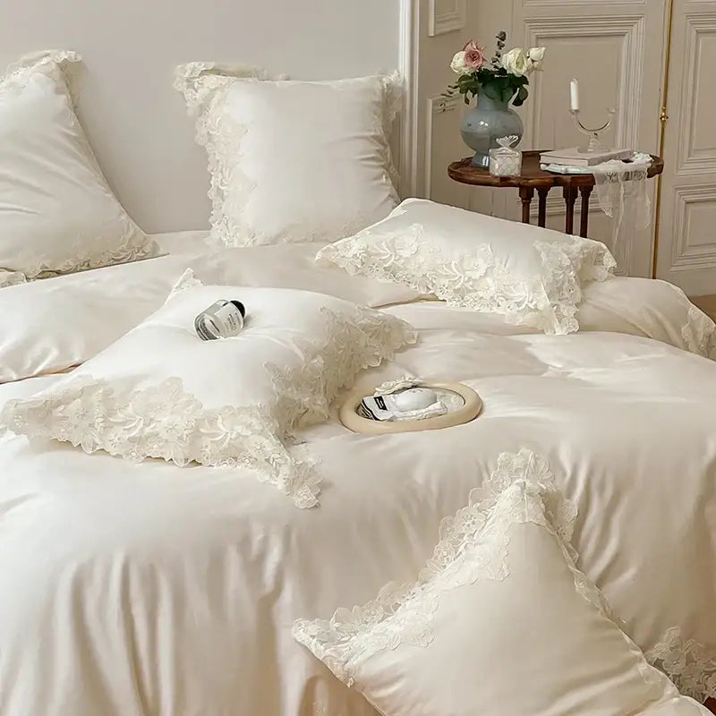 Cream-colored satin bedding set with white lace trim showcasing decorbites french wedding chic lace duvet cover design