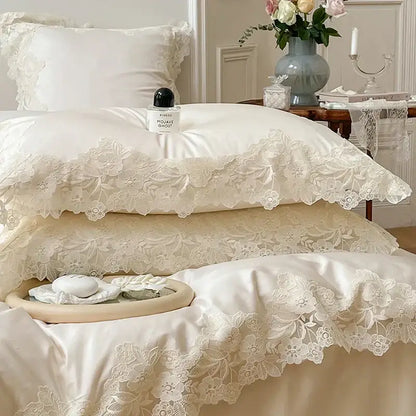 Elegant ivory lace-trimmed pillowcases with floral embroidery and satin lining in decorbites french wedding chic bedding set