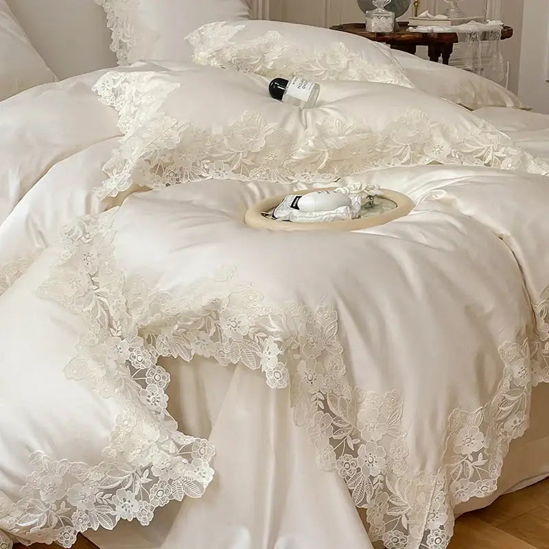 Cream satin duvet cover with delicate white floral lace trim in decorbites french wedding chic bedding set