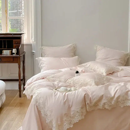 Blush pink satin duvet set with delicate white lace trim from decorbites french wedding chic bedding set collection