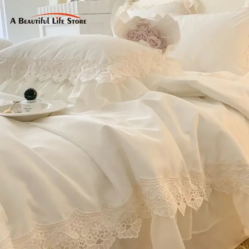 White lace-trimmed bedding set with delicate floral embroidery and soft fabric from decorbites french wedding lace collection