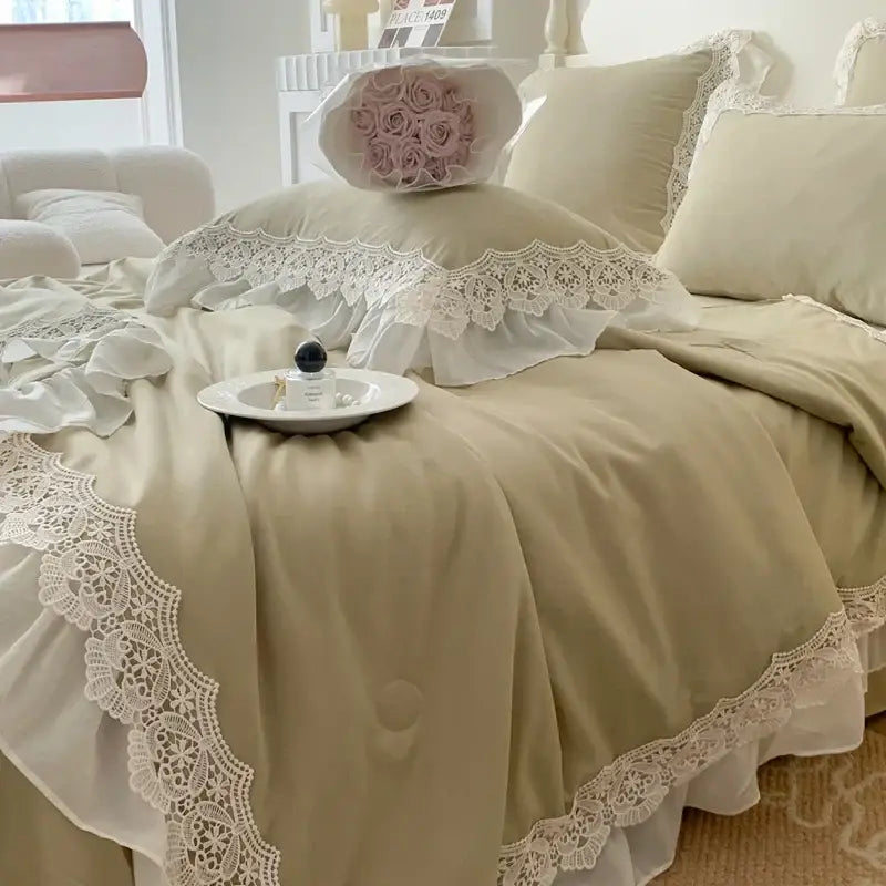 Beige lace-trimmed bedding set with ruffled edges and delicate white floral embroidery from decorbites french wedding lace collection