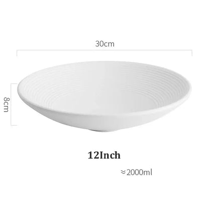 A frosted glaze white ceramic soup bowl with subtle concentric ridges by decorbites measuring 30cm by 8cm