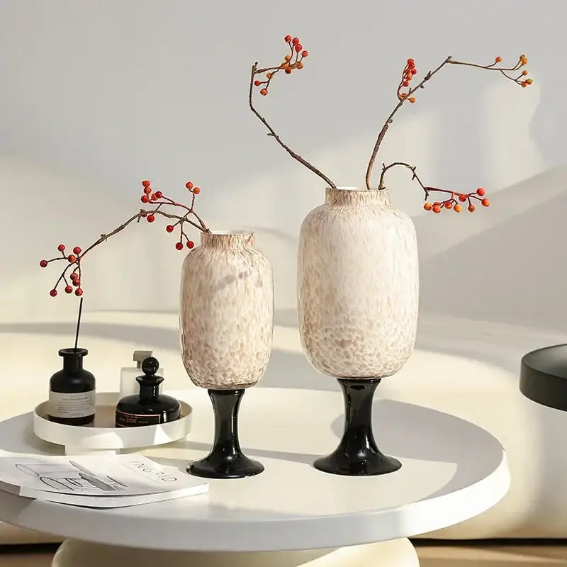 Two cream-colored ceramic vases with frosted marbled dot texture and glossy black stems for living room decorbites dot texture
