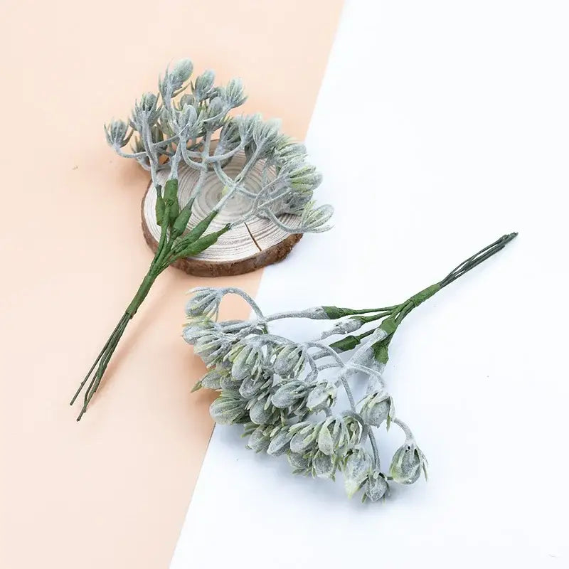 Faux silver-frosted succulent bouquet with green stems in frosted silver and brown decorative artificial plants decorbites bundle