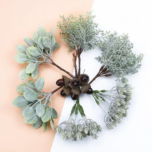 Frosted silver and brown decorative artificial plants bundle featuring artificial greenery with frosted leaves and dark acorns