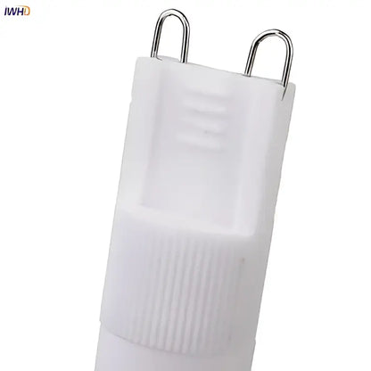 Frosted white ceramic g9 led bulb with ribbed texture and metallic contacts for energy-efficient lighting decorbites creamic