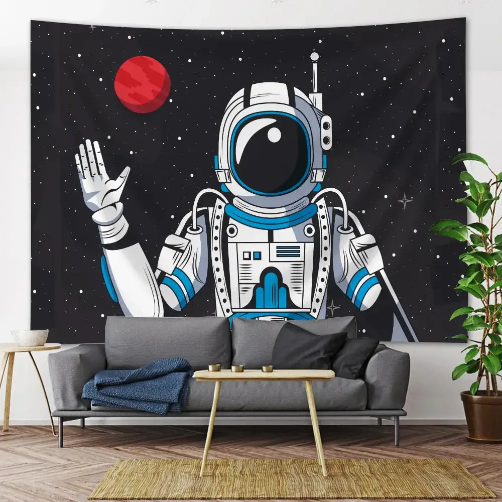 Black wall tapestry featuring a cartoon astronaut in white and blue suit waving with red planet and stars decorbites futuristic astronaut