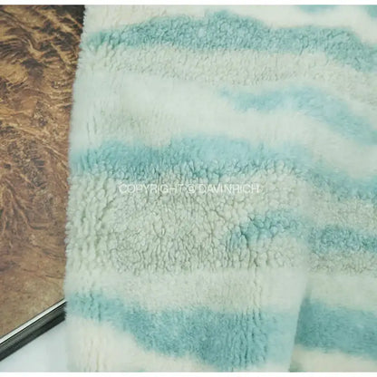 Soft plush fleece cushion covers with wavy light blue and off-white stripes galaxy inspired jupiter decorbites style