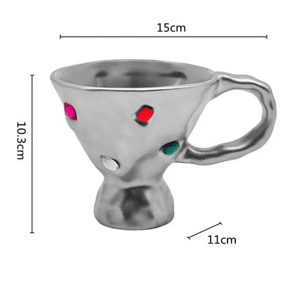 Silver metallic gemstone setting ceramic breakfast mug with textured sculpted body and colorful gemstone accents