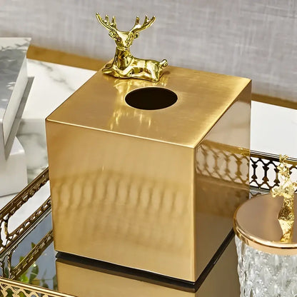Gold-finished geometric animal tissue box with brass color featuring a small golden deer decorbites living room decor