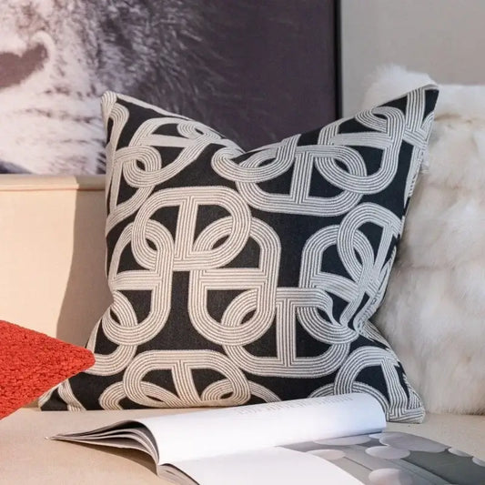 Geometric black and cream jacquard pillow cover set featuring intricate pattern for living room decor