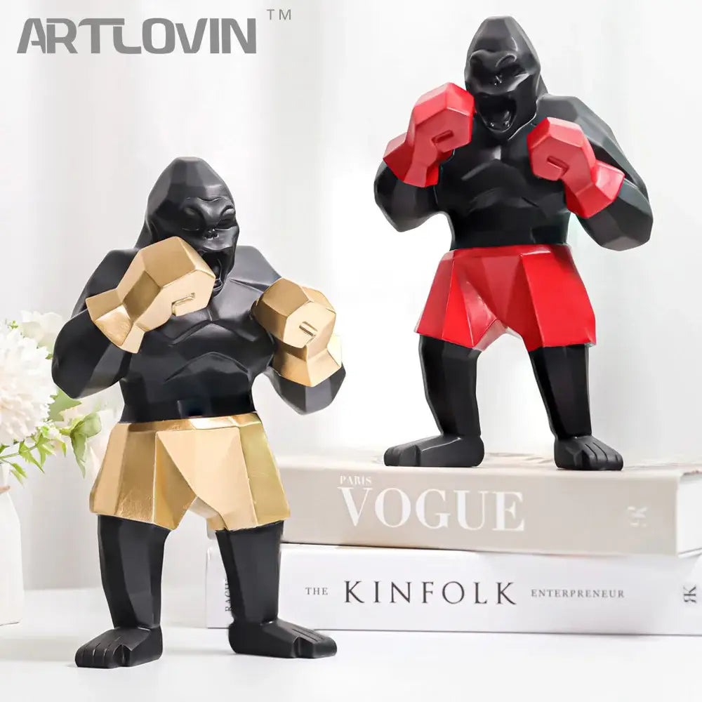 Geometric black and gold king kong sculpture by decorbites featuring stylized gorilla figurines for office desk decor