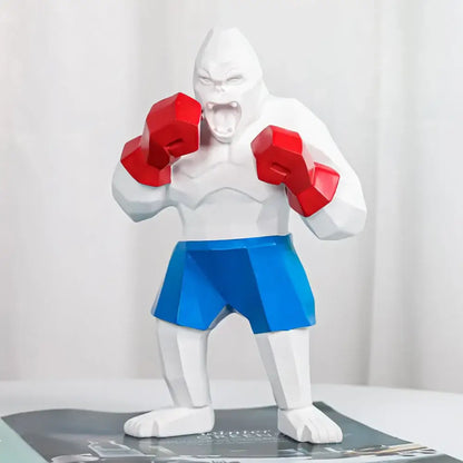 White geometric gorilla figurine with red boxing gloves and blue shorts for decorbites king kong sculpture desk decor