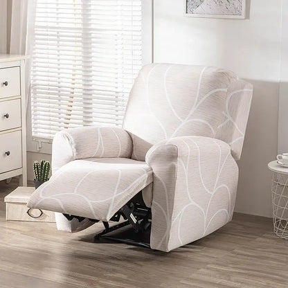 Beige recliner chair with white abstract leaf pattern fabric cover shown with geometric black and red stretch recliner cover