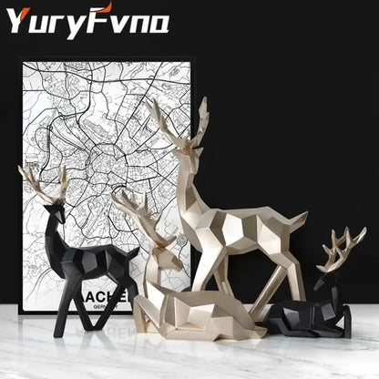 Set of three decorbites deer sculpture figurines in black and metallic gold with geometric angular facets for modern decor