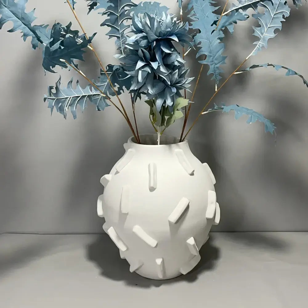 White ceramic geometric block ceramic vase with rounded body and rectangular ridges for modern decorbites decor