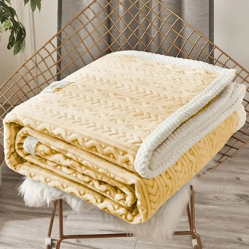 A cozy cream fleece flannel blanket with white border and chevron stitching for warm bedroom decorbites coral fleece