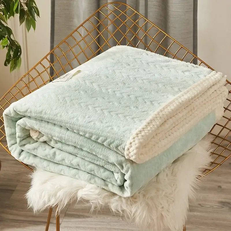 A soft mint green and cream fleece flannel blanket with herringbone texture and chunky knit border for bedroom decorbites coral fleece
