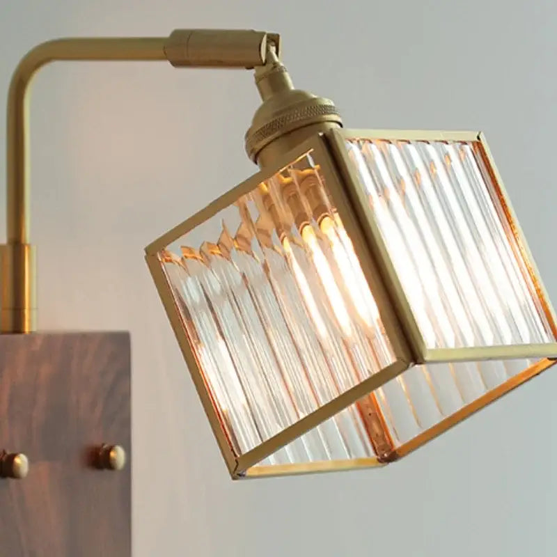Brass led wall light with a geometric blue glass square ribbed shade for dining room decorbites brass led design