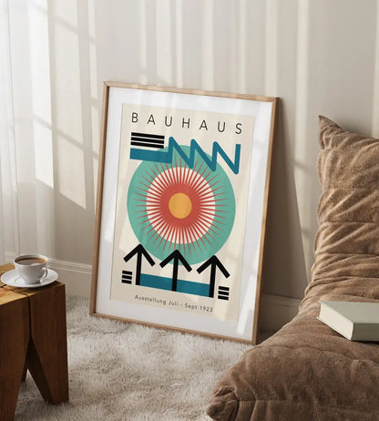 A framed decorbites bauhaus geometric canvas print featuring bold blue teal and orange on an off-white background