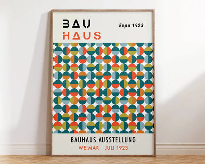 A framed decorbites bauhaus geometric canvas print with teal orange and yellow overlapping circles on white background