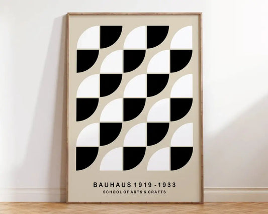 Minimalist decorbites bauhaus geometric canvas print with black white semicircles on beige in light wood frame for home decor